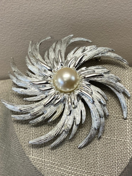 Sarah Coventry Jewelry - Sarah Coventry "Pinwheel" brooch. 3”.  1960s, silver-tone, faux pearl center